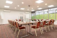 a conference room with a long table and chairs at Holiday Inn Express Amiens, an IHG Hotel in Amiens