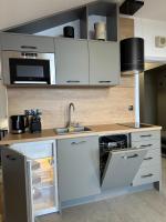 Kuchyň nebo kuchyňský kout v ubytování Sana Ski apartment 702 in Flora, Borovets