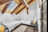 Postel nebo postele na pokoji v ubytování Hotel U Krále Jiřího