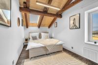 Postel nebo postele na pokoji v ubytování Hotel U Krále Jiřího