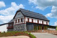 a large building with a lot of windows at Apartmán Lamba Klínovec in Loučná pod Klínovcem
