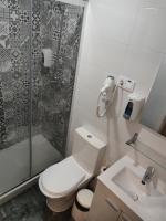 A bathroom at Good Stay Rooms