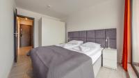 Posteľ alebo postele v izbe v ubytovaní Apartamenty Sun & Snow Sanatoryjna - blisko plaży