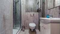 Kúpeľňa v ubytovaní Apartamenty Sun & Snow Sanatoryjna - blisko plaży