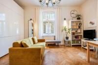 Televízia a/alebo spoločenská miestnosť v ubytovaní Historical Wine Apartment