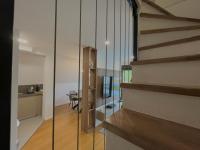 a room with a staircase with a glass wall at Villa Anemar in Blidinje