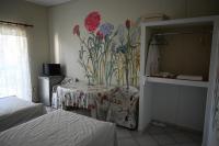 A bed or beds in a room at Ιlias rooms