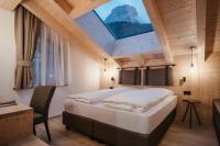 A bed or beds in a room at Vila Altonn