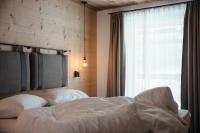 A bed or beds in a room at Vila Altonn