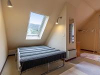 a bedroom with a bed in a room with a window at Appartement Luz-Saint-Sauveur, 1 pièce, 5 personnes - FR-1-402-136 in Luz-Saint-Sauveur