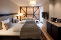 Postel nebo postele na pokoji v ubytování Ascot Hotel