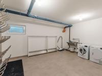 a laundry room with a washing machine and a washer at Apartment Das Georgen- Schmitten by Interhome in Fürstau