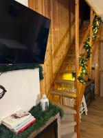 Telewizja i/lub zestaw kina domowego w obiekcie Cataleya Laceno