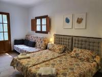Posteľ alebo postele v izbe v ubytovaní Molino de Las Pilas - Ecoturismo - Caminito del Rey