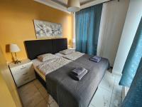 Posteľ alebo postele v izbe v ubytovaní Royal Apartments & Rooms