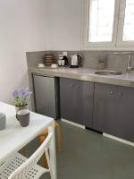 Kuchyň nebo kuchyňský kout v ubytování Sabbia Calda Apartments