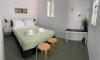 Postel nebo postele na pokoji v ubytování Sabbia Calda Apartments