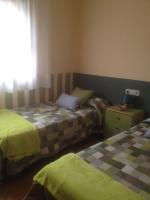 Posteľ alebo postele v izbe v ubytovaní Apartaments El Ribal