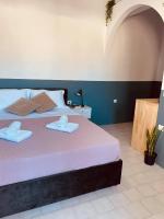 Postel nebo postele na pokoji v ubytování Sabbia Calda Apartments