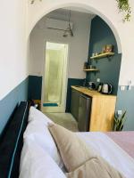 Postel nebo postele na pokoji v ubytování Sabbia Calda Apartments