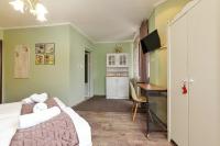 Postel nebo postele na pokoji v ubytování Villa Kaja Bansko