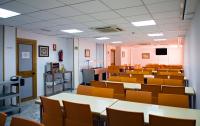 A television and/or entertainment centre at Albergue Inturjoven Granada