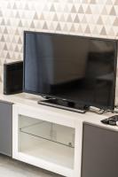 Telewizja i/lub zestaw kina domowego w obiekcie Attila Luxury Apartment