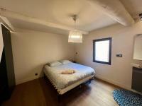 Posteľ alebo postele v izbe v ubytovaní Appartement 100M2 dernier étage - chambre atypique