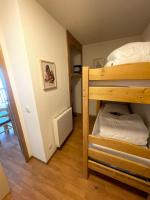 Posteľ alebo postele v izbe v ubytovaní Appartement Orelle 3 Vallées - Spa & Piscine - Apt 112