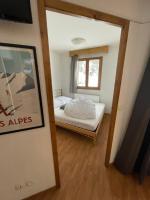 Posteľ alebo postele v izbe v ubytovaní Appartement Orelle 3 Vallées - Spa & Piscine - Apt 112