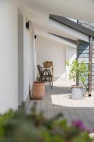 A balcony or terrace at Hotel Roxy & Beach