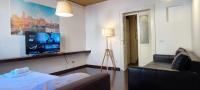 A bed or beds in a room at Liberty Futura Home