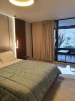 Posteľ alebo postele v izbe v ubytovaní Adell Miramare Golden Loft