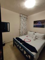 Postel nebo postele na pokoji v ubytování Porto Sharm-Elsheikh
