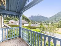 a view from the balcony of a house with mountains in the background at Appartement Cauterets, 4 pièces, 7 personnes - FR-1-401-276 in Cauterets