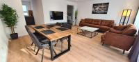 TV a/nebo společenská místnost v ubytování Noahs Apartments