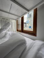 Postel nebo postele na pokoji v ubytování Rotinis Hostel