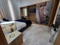 TV a/nebo společenská místnost v ubytování Casa Gloria Apartments