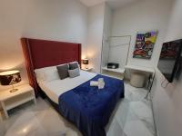Postel nebo postele na pokoji v ubytování Casa Gloria Apartments