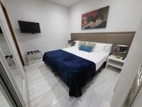 Postel nebo postele na pokoji v ubytování Casa Gloria Apartments