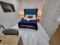 Postel nebo postele na pokoji v ubytování Casa Gloria Apartments