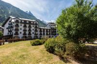 a large building with a tree in front of it at Chamonix Sud - Forclaz 304 - Happy Rentals in Chamonix