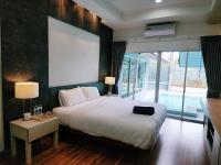 Postel nebo postele na pokoji v ubytování I am pool villa Pattaya no 5