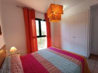 Postel nebo postele na pokoji v ubytování Apartamento con solárium en Marina Sant Jordi (MSJ81)
