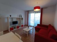 TV a/nebo společenská místnost v ubytování Apartamento con solárium en Marina Sant Jordi (MSJ81)
