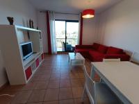 TV a/nebo společenská místnost v ubytování Apartamento con solárium en Marina Sant Jordi (MSJ81)