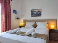 Postel nebo postele na pokoji v ubytování Coral Villas
