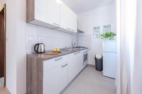 Kuchyňa alebo kuchynka v ubytovaní Apartments Villa Made 4U