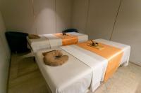 Ein Bett oder Betten in einem Zimmer der Unterkunft Centara Grand At CentralWorld