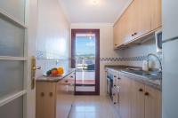 Kuchyň nebo kuchyňský kout v ubytování Apartamento Coral Beach - PlusHolidays
